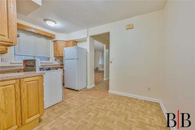 2076 E 63rd St, Brooklyn, NY 11234 - kitchen featuring white appliances, light countertops, and baseboards