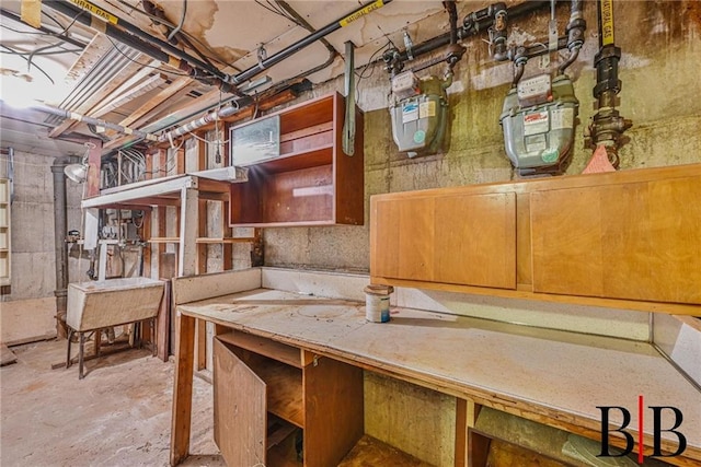2076 E 63rd St, Brooklyn, NY 11234 - unfinished basement featuring gas meter, a workshop area, and a sink