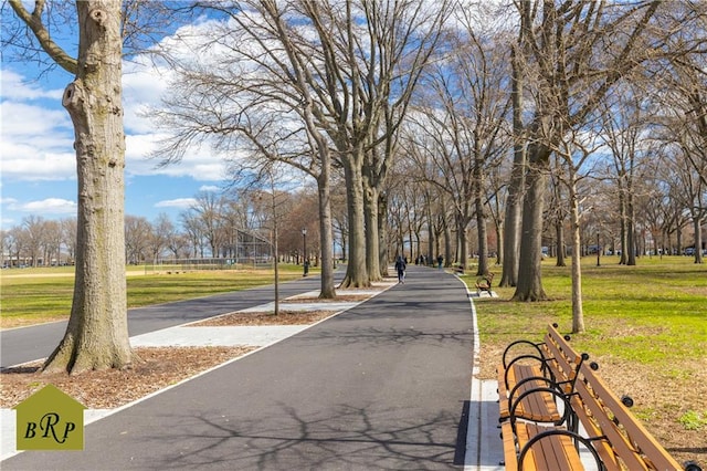 surrounding community with a lawn