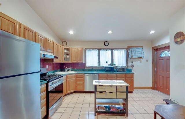 447 Greeley Ave, Staten Island, NY 10306 - kitchen with stainless steel appliances, under cabinet range hood, healthy amount of natural light, tasteful backsplash, and recessed lighting