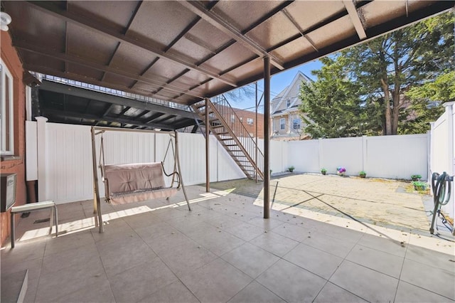 4640 Bedford Ave, Brooklyn, NY 11235 - view of patio / terrace with a fenced backyard and stairway