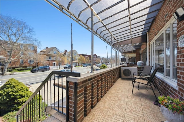4640 Bedford Ave, Brooklyn, NY 11235 - view of patio / terrace with ac unit, a pergola, and a residential view