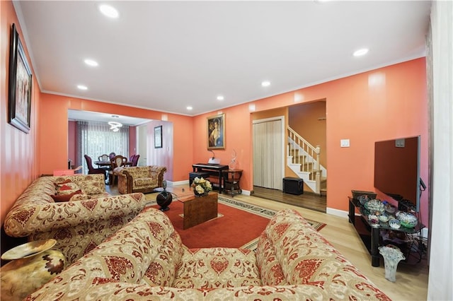 4640 Bedford Ave, Brooklyn, NY 11235 - living room featuring crown molding, baseboards, recessed lighting, and stairway