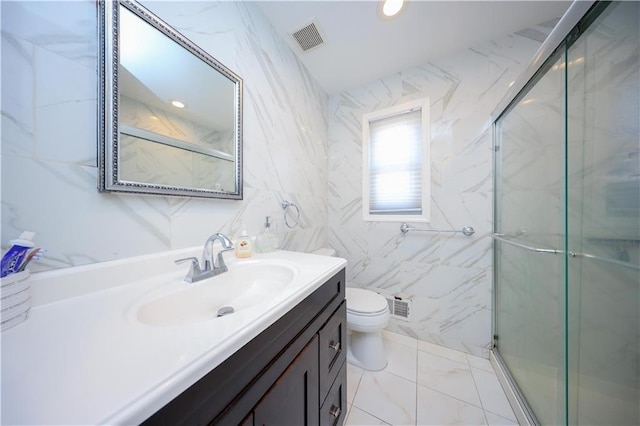 full bathroom with vanity, visible vents, and a stall shower