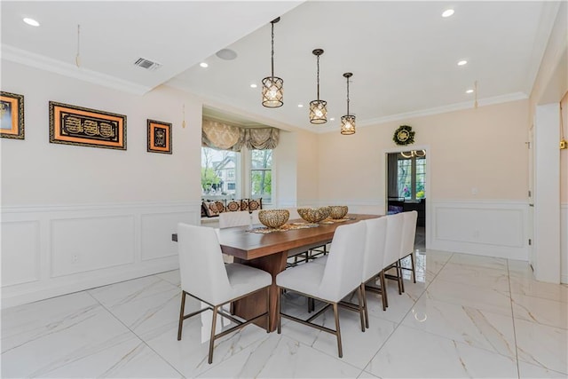 21 Sprague Ave, Staten Island, NY 10307 - dining area featuring light marble finish floors, a wainscoted wall, a decorative wall, plenty of natural light, and recessed lighting