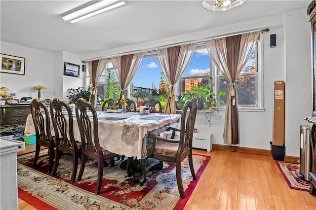 1655 Flatbush Ave Unit B204, Brooklyn, NY 11210 - dining area with crown molding, baseboards, and light wood-style floors