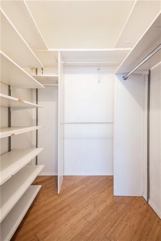 2944 W 5th St Unit 14F, Brooklyn, NY 11224 - walk in closet with wood finished floors