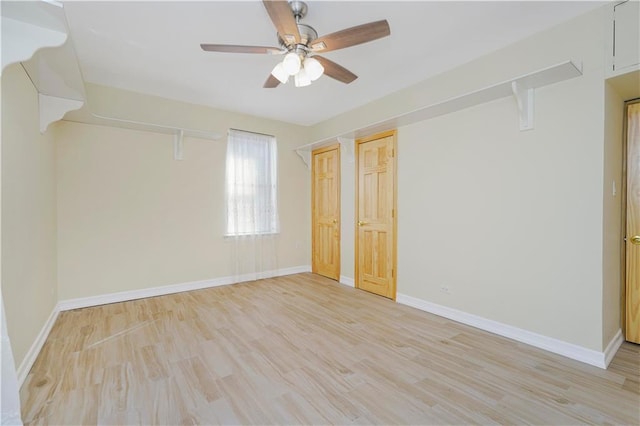 2645 Homecrest Ave Unit 4C, Brooklyn, NY 11235 - unfurnished bedroom featuring light wood finished floors, two closets, baseboards, and a ceiling fan