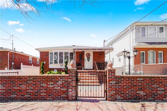 view of front of house featuring a gate and a fenced front yard