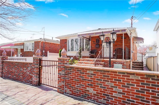 view of front of home featuring a gate and a fenced front yard