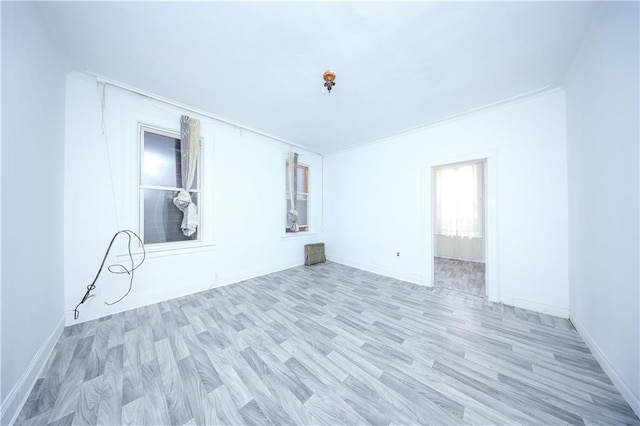 3029 Brighton 5th St Unit 3, Brooklyn, NY 11235 - spare room with light wood-type flooring and baseboards