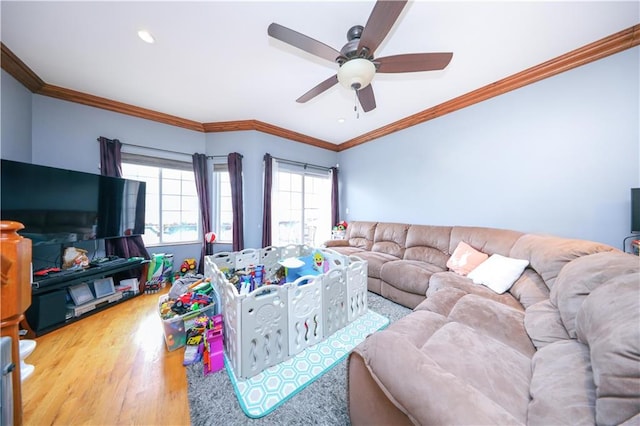 living area with crown molding, recessed lighting, ceiling fan, and wood finished floors