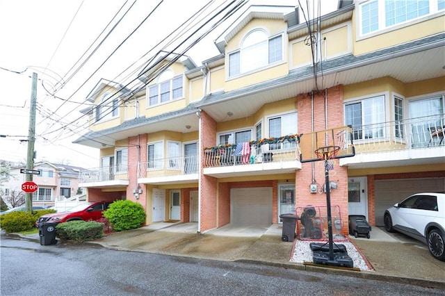 19 Ostrich Ct, Staten Island, NY 10309 - view of property featuring an attached garage and driveway