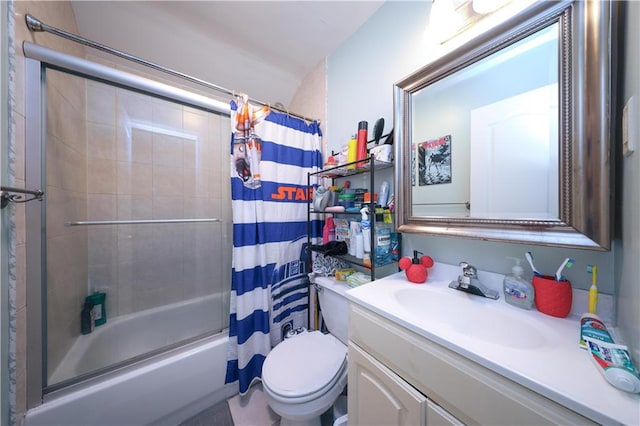 bathroom featuring shower / tub combo with curtain, toilet, and vanity