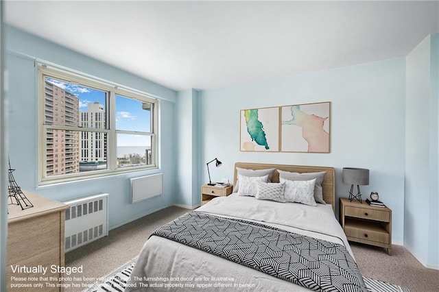 bedroom featuring baseboards, carpet, and radiator