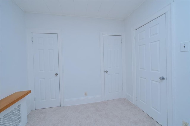 unfurnished bedroom with carpet flooring