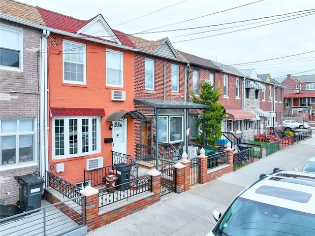 2961 Voorhies Ave, Brooklyn, NY 11235 - multi unit property with entry steps, brick siding, a wall unit AC, and a residential view