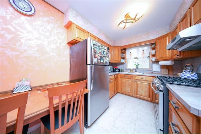 2235A 84th St Unit 1C, Brooklyn, NY 11214 - kitchen with stainless steel appliances, range hood, open shelves, light tile patterned floors, and light countertops