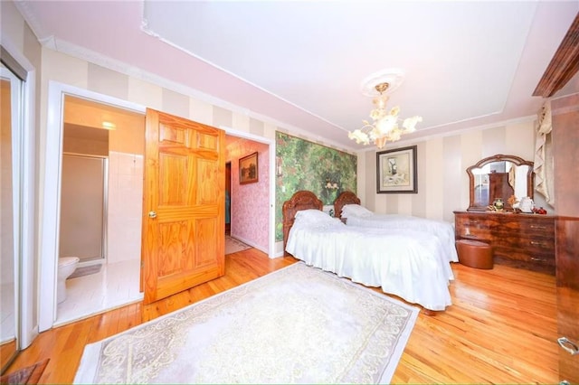 2235A 84th St Unit 1C, Brooklyn, NY 11214 - bedroom featuring a chandelier, wood finished floors, and crown molding