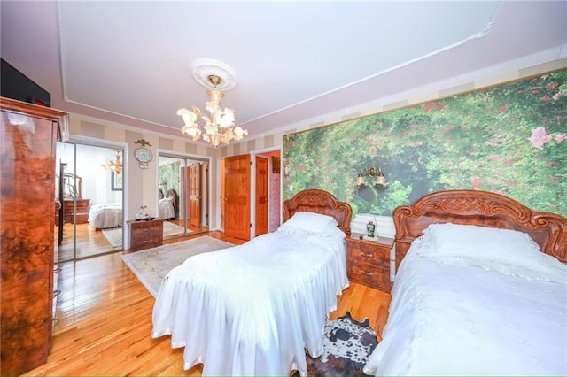 2235A 84th St Unit 1C, Brooklyn, NY 11214 - bedroom with a chandelier and wood finished floors