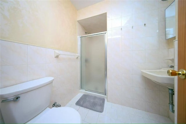 2235A 84th St Unit 1C, Brooklyn, NY 11214 - full bath with tile walls, a stall shower, tile patterned floors, and pet washing area