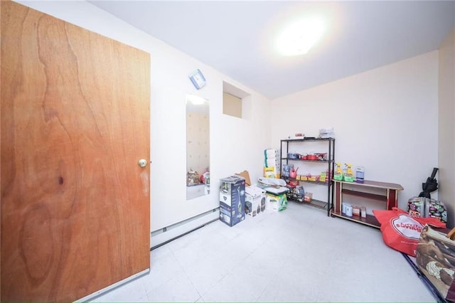 2235A 84th St Unit 1C, Brooklyn, NY 11214 - rec room with baseboard heating and tile patterned floors