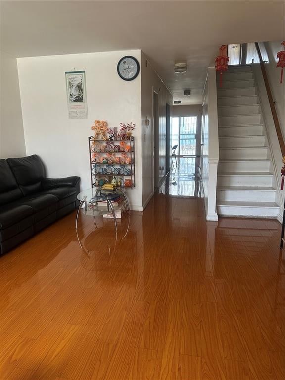 2878 W 16th St, Brooklyn, NY 11224 - living area with wood finished floors and stairs