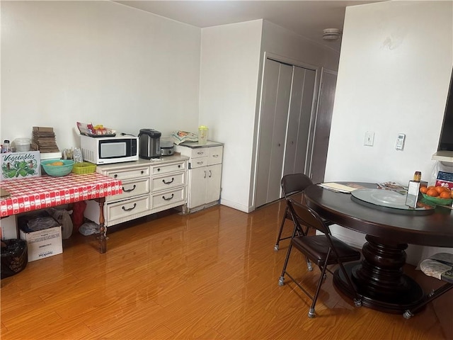 2878 W 16th St, Brooklyn, NY 11224 - dining area with wood finished floors