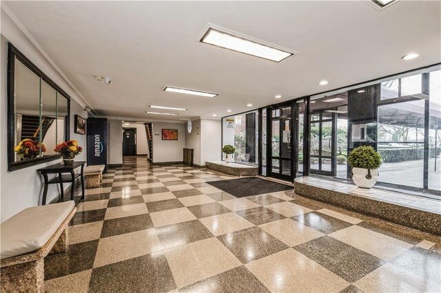 1119 Ocean Pkwy Unit 2A, Brooklyn, NY 11230 - building lobby featuring expansive windows and recessed lighting