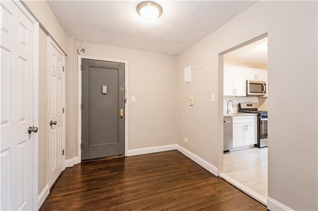 1119 Ocean Pkwy Unit 2A, Brooklyn, NY 11230 - foyer featuring dark wood-type flooring and baseboards