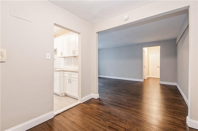 1119 Ocean Pkwy Unit 2A, Brooklyn, NY 11230 - empty room with wood finished floors and baseboards