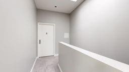 7902 16th Ave, Brooklyn, NY 11214 - hall featuring baseboards and light colored carpet