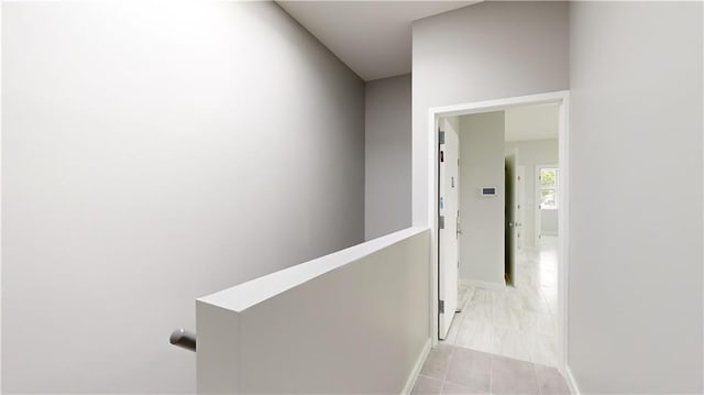7902 16th Ave, Brooklyn, NY 11214 - hall featuring baseboards and an upstairs landing