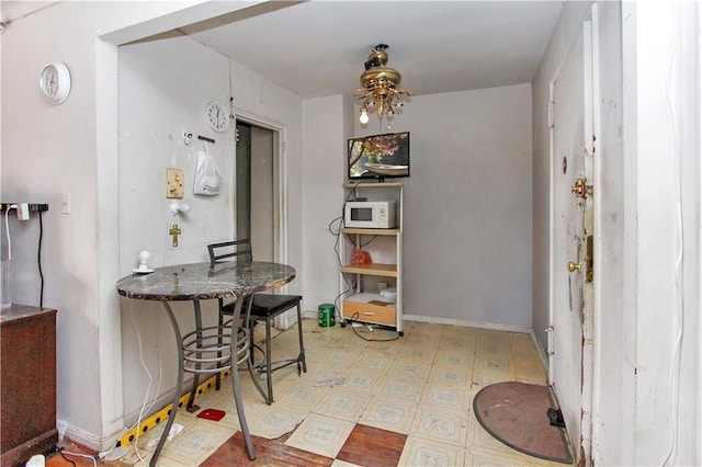 dining area featuring tile patterned floors