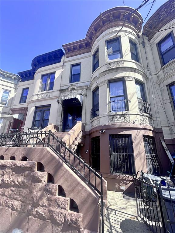 view of building exterior with stairway