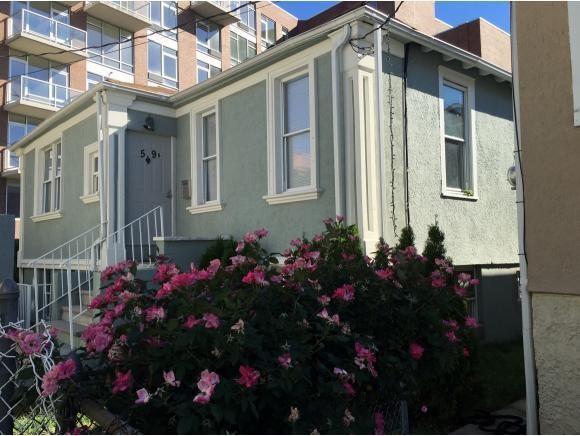 59B Brighton 10th Ct, Brooklyn, NY 11235 - view of side of home with stucco siding