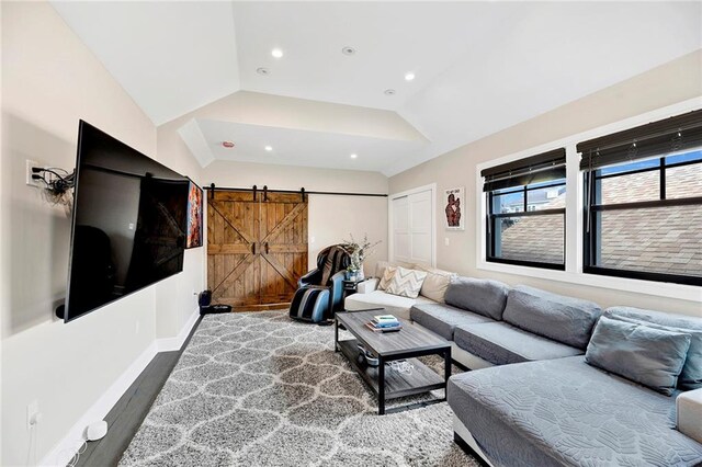 53 Andrews St, Staten Island, NY 10305 - living room featuring wood finished floors, lofted ceiling, recessed lighting, a barn door, and baseboards
