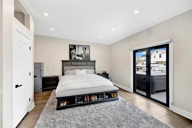 bedroom with recessed lighting, baseboards, access to outside, and light wood-type flooring
