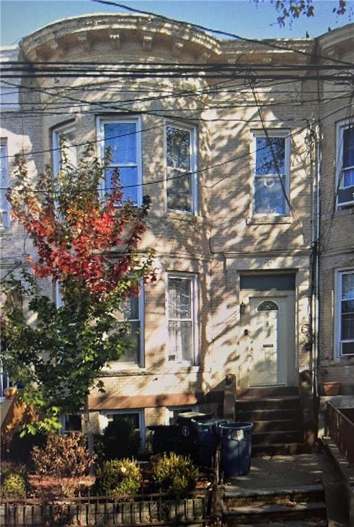 1051 71st St, Brooklyn, NY 11228 - rear view of house featuring entry steps