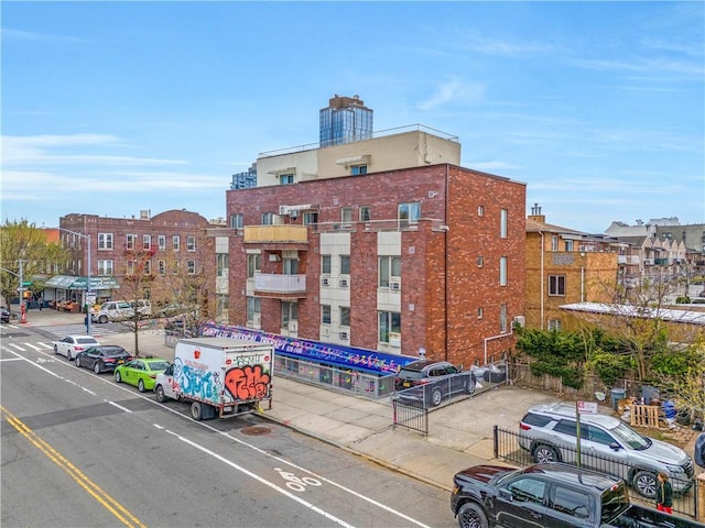 2138 Bath Ave Unit 1A, Brooklyn, NY 11214 - view of property featuring uncovered parking