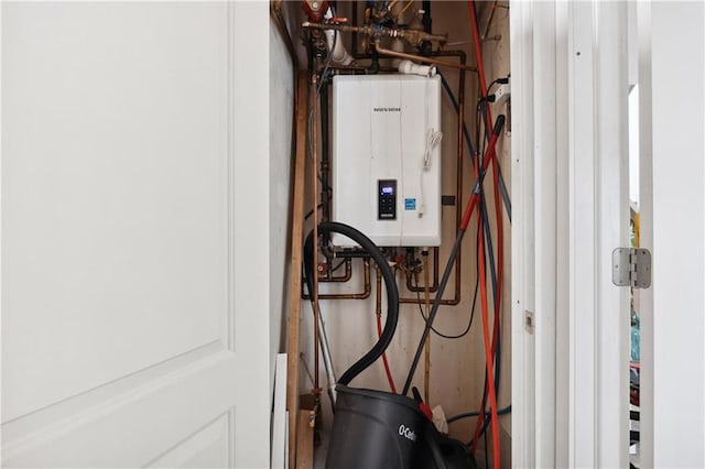 2752 Ocean Ave Unit 6A, Brooklyn, NY 11229 - utility room featuring tankless water heater