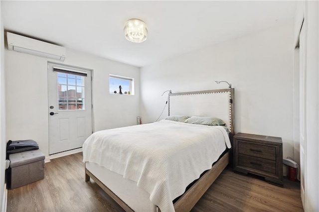 2752 Ocean Ave Unit 6A, Brooklyn, NY 11229 - bedroom featuring an AC wall unit and wood finished floors