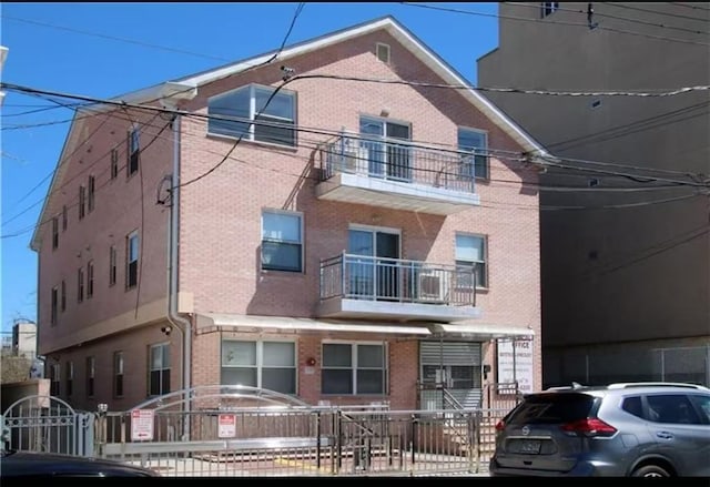 exterior space with brick siding