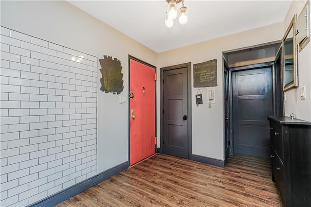 9707 4th Ave Unit 4P, Brooklyn, NY 11209 - foyer entrance with dark wood-type flooring and baseboards