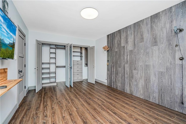9707 4th Ave Unit 4P, Brooklyn, NY 11209 - unfurnished bedroom with wood finished floors and multiple closets