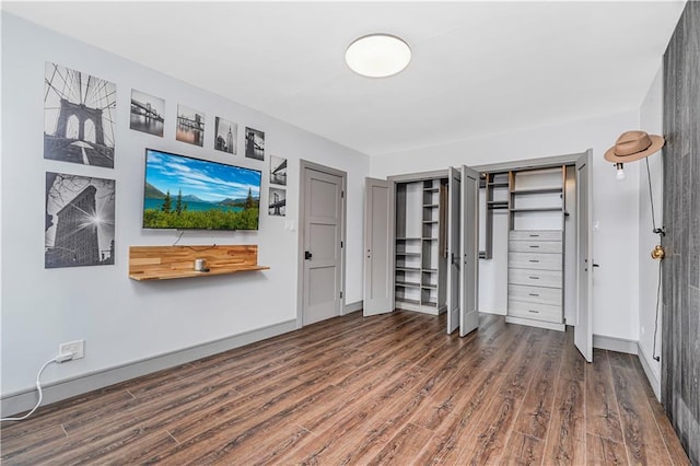 9707 4th Ave Unit 4P, Brooklyn, NY 11209 - unfurnished bedroom with wood finished floors and multiple closets