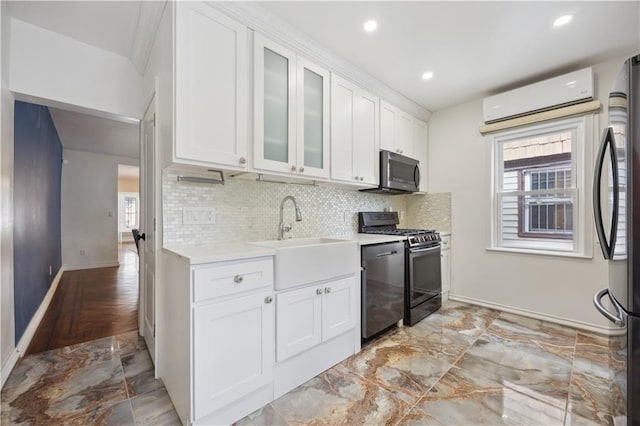 kitchen with range with gas stovetop, marble finish floor, freestanding refrigerator, stainless steel microwave, and dishwasher