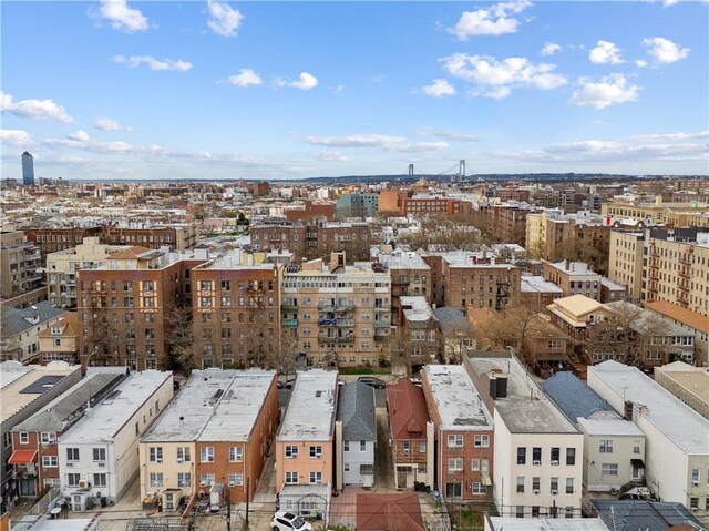 drone / aerial view featuring a city view