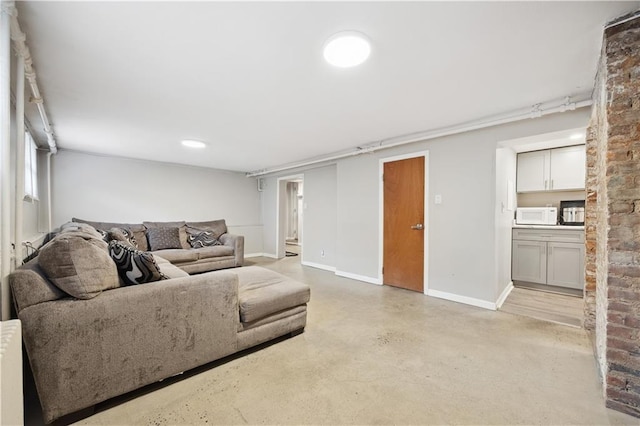 980 Van Duzer St, Staten Island, NY 10304 - living area with finished concrete flooring and baseboards