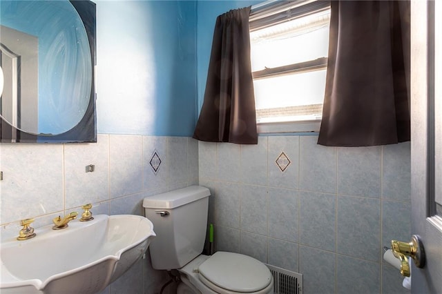 74 E Brandis Ave, Staten Island, NY 10308 - half bath with toilet, a sink, and tile walls